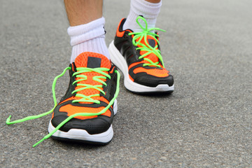 shoelace of running shoes on the street 