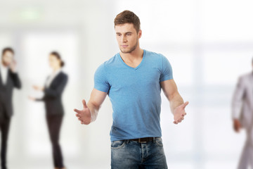 Young man with open hands.