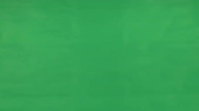 Man's Hand Brandishing Switch Blade Knife Over Green Screen