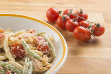pasta called trofie with salmon