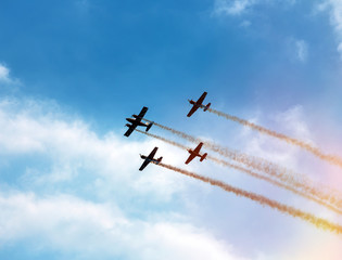 Silhouette sport aircraft in air show