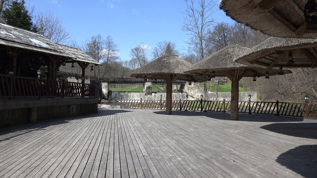 empty resort and people recreate near waterfall. 4K