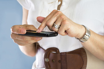 Young woman using cellphone