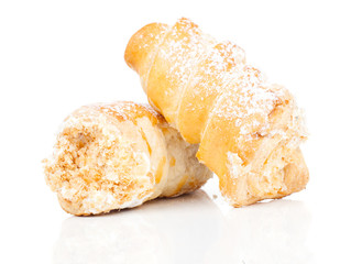 puff rolls with cream on white background