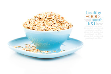 Cornflakes in porcelain bowl isolated on white background