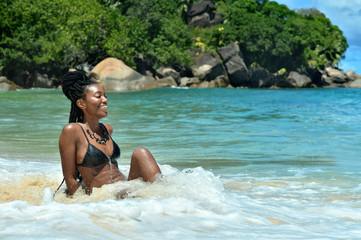 girl sitting on the beach