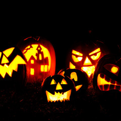 Fototapeta premium Halloween pumpkin head jack lantern with scary evil faces spooky