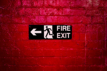 Sign Informing about the fire escape .
