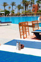 Fototapeta premium Swimming pool with tables