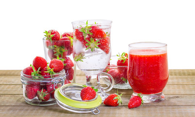 Strawberry smoothie with fresh berries isolated on white backgro