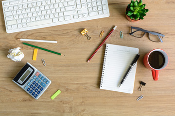 office supply and Cup of coffee on desk