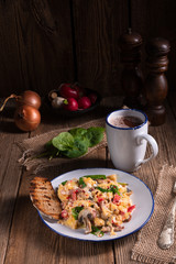 Scrambled eggs with tomatoes and spinach