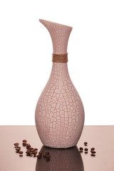 vase - a jug and coffee beans