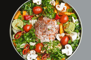 Roasted pork roulade with potatoes, tomato and mushroom 