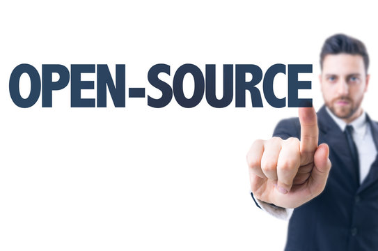 Business man pointing the text: Open-Source