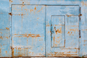 old garage door with traces of rust