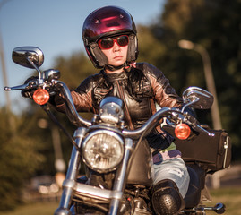 Biker girl on a motorcycle