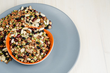 legumes in a dish on table, close up, background