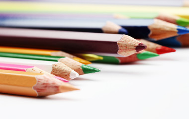 Colorful of wooden color pencils isolated on white background