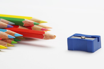 Sharpener pencil and color pencils group, blunt red pencil