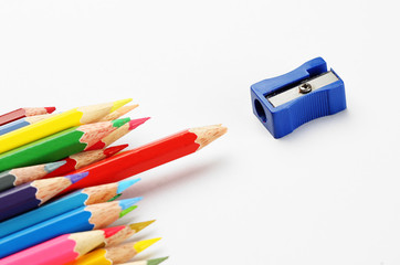 Sharpener pencil and color pencils group, blunt red pencil
