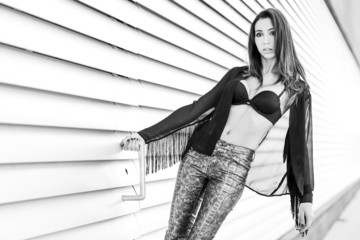 Woman wearing transparent shirt and black bra