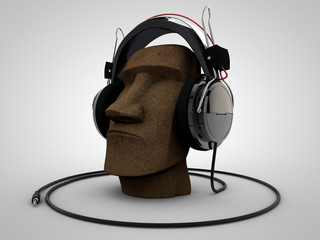 Moai head stone wearing headphones