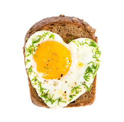 Sandwich with fried eggs in the shape of a heart
