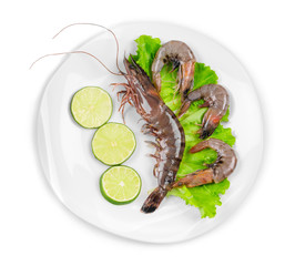 Raw shrimps on plate.