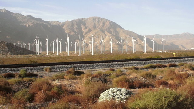 Green Wind Turbines Generate Energy 