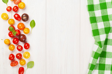 Colorful cherry tomatoes and basil