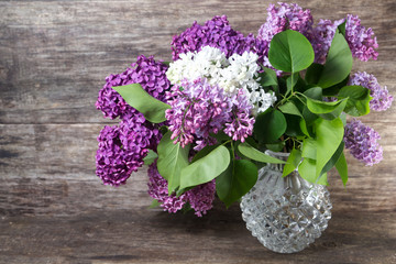 Bouquet of  lilac spring flowers in a vase