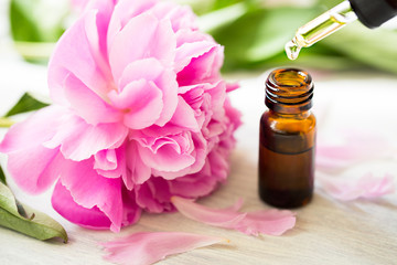 Aromatherapy, essentials oils, peony flowers - obrazy, fototapety, plakaty