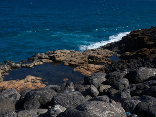 Fototapeta na wymiar Blue ocean water of Fuerteventura coast, Canary Islands