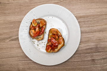 pane bruschetta con pomodoro, olio e origano