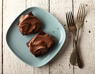 chocolate cake on a white wooden background