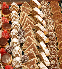 Colorful desserts and pastry served on a wedding party