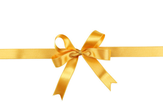 Golden bow on white background