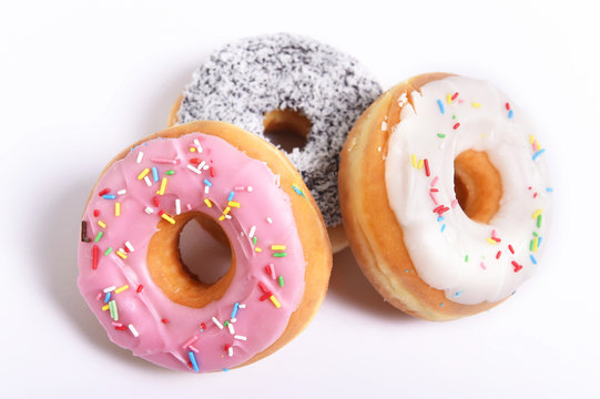 delicious tempting sugar donuts in toppings  sweet addiction