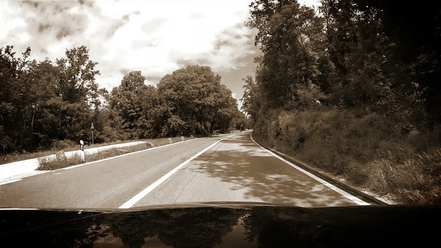 Black and White Footage: Mountain road inside car view near Rabac, Croatia
