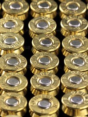 A row of 45 caliber ammunition copper plated bullets