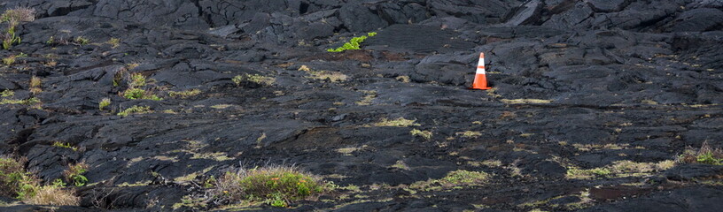 Construction cone on a lava field