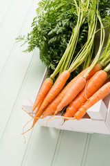 Carrots on wooden table