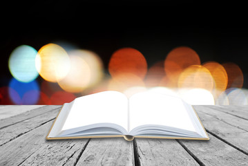 Open book with twilight background