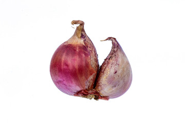 Thailand small red onion on a white background.