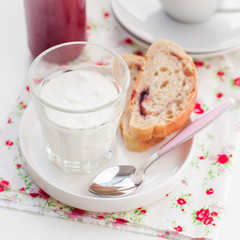 Greek Yogurt with Berry Sauce and Slices of Sweet Bread