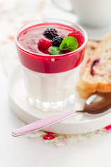 Greek Yogurt with Berry Sauce and Slices of Sweet Bread