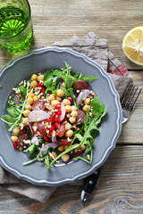  salad with arugula and chickpea on a plate