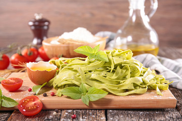 tagliatelle on board with ingredients