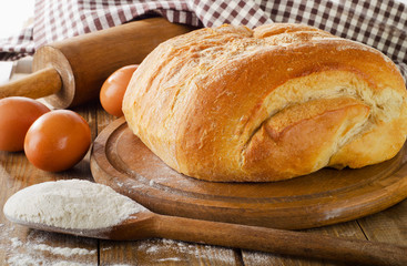 fresh bread on a wooden  table